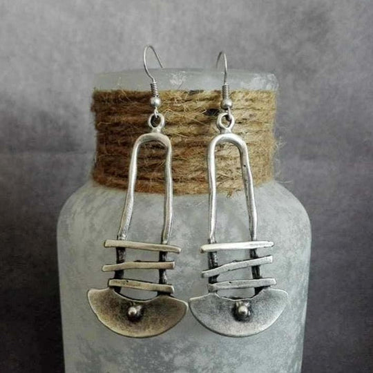 Kolczyki koła półkole z geometrycznym wzorem