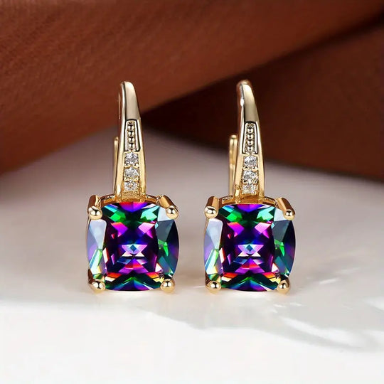 Złote kolczyki koła z kamieniem szlachetnym Mystic Sapphire