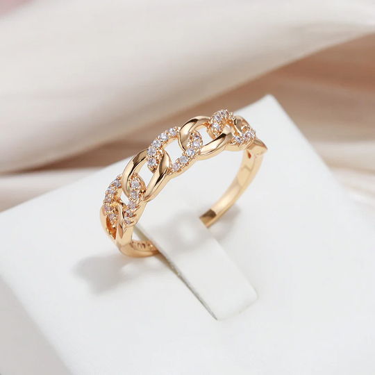 Elegancki, złocisty pierścień Glieder-Ring