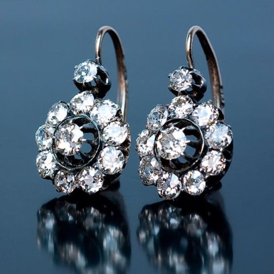 Vintageowe zaokrąglone kolczyki z inkrustowanymi kryształami