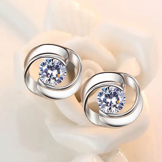 Vintage'owe srebrne kolczyki spirale z cyrkoniami