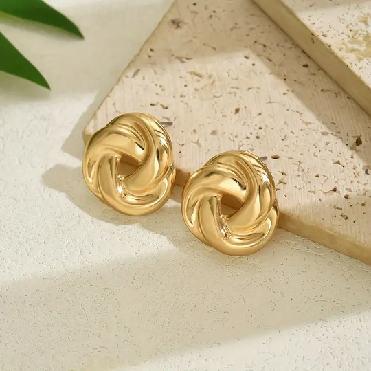 Vintage'owe złote kolczyki spirale